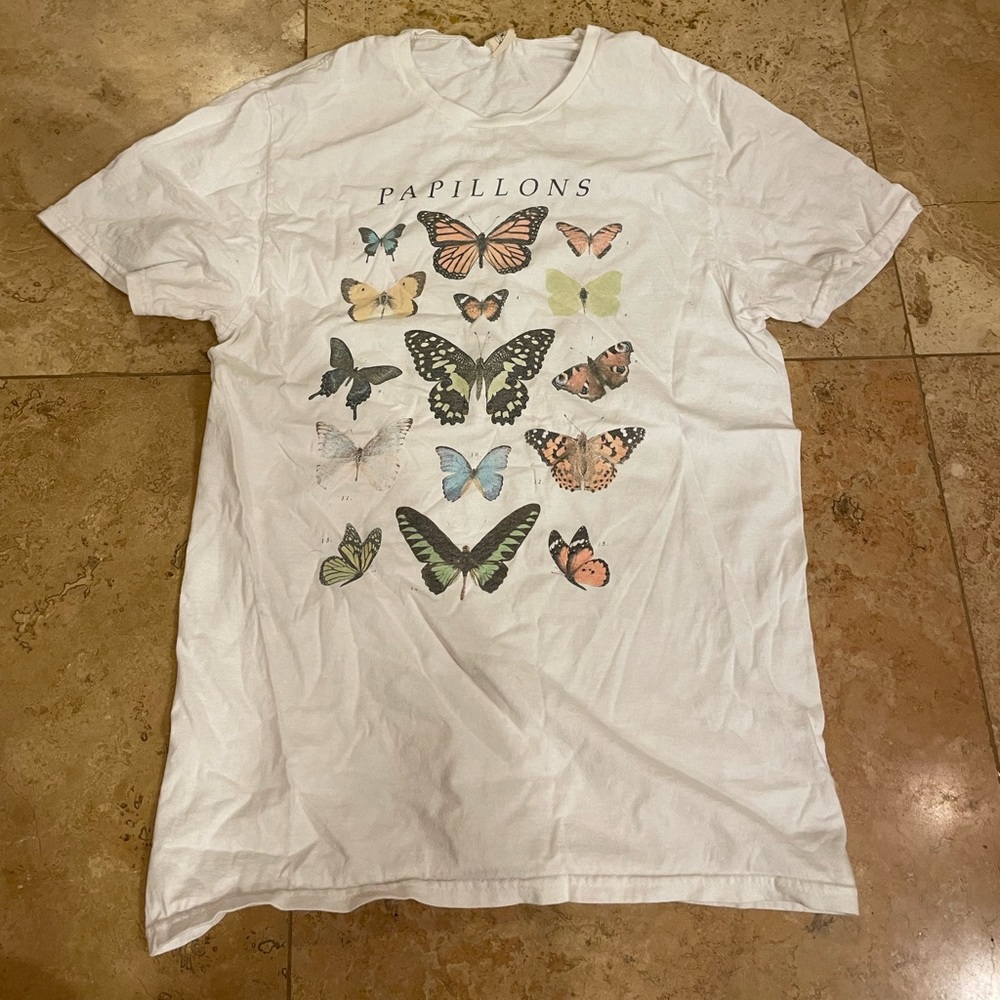 Urban Outfitters. Size Medium. Cream Shirt with butterfly’s on it. Barely worn.